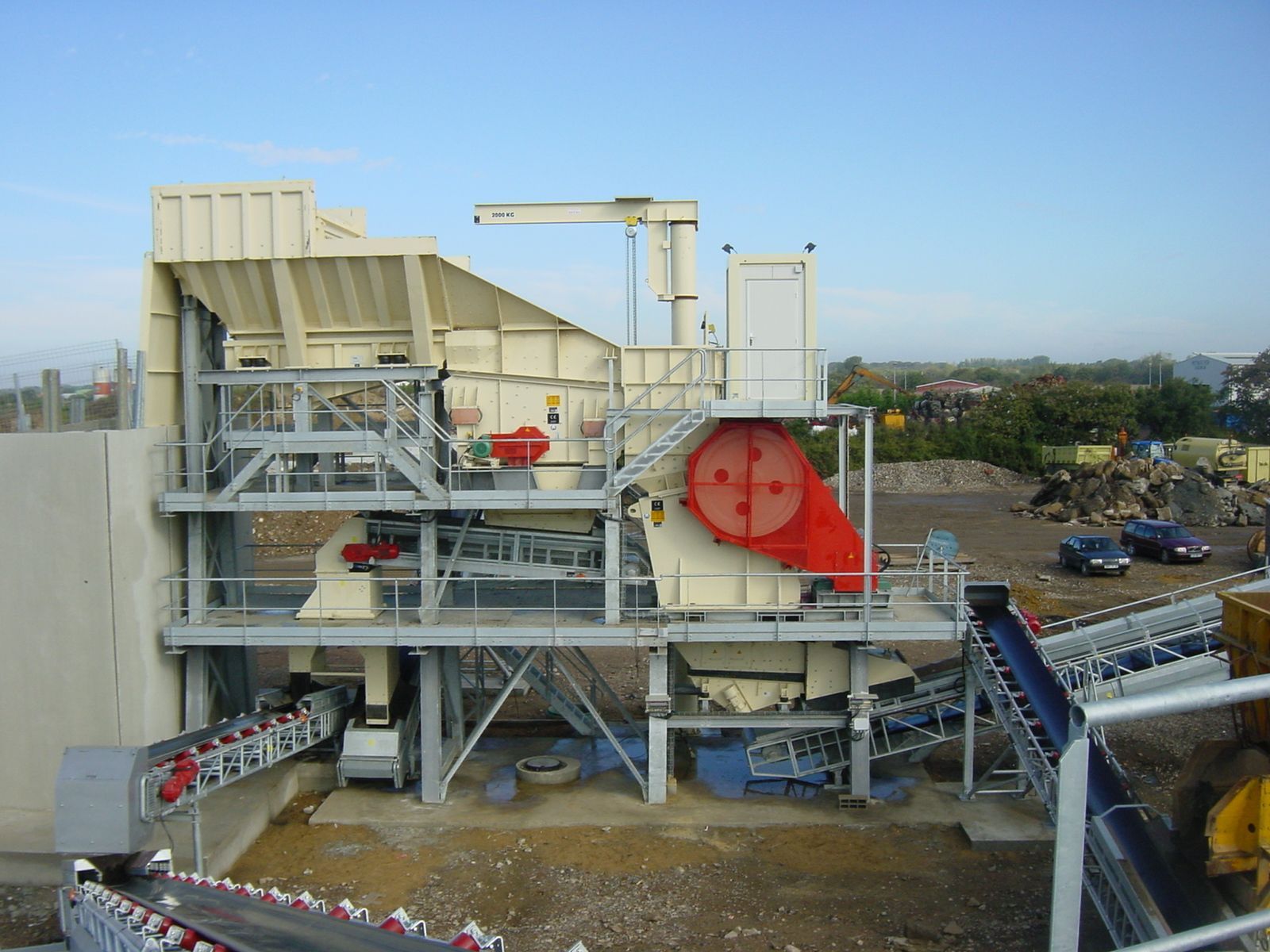 A mineral processing machine sitting on the ground in a mining facility